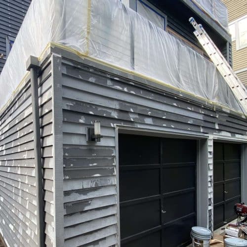 Preparation of the exterior of a house in Seattle before painting.